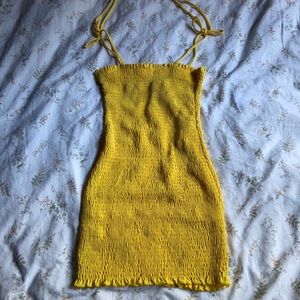 Yellow ruched mini dress with tie straps size small good condition